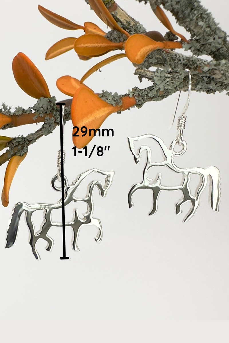 Load image into Gallery viewer, Silver horse-shaped earrings with a measurement indicator on a white background.

