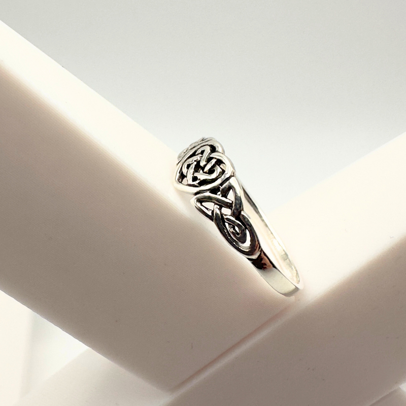 Load image into Gallery viewer, Silver ring with intricate design on a white surface
