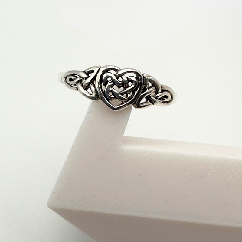 Load image into Gallery viewer, Silver ring with intricate design on a white surface
