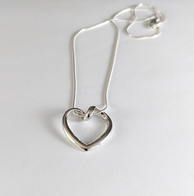 Load image into Gallery viewer, Looped Heart Necklace in Sterling Silver
