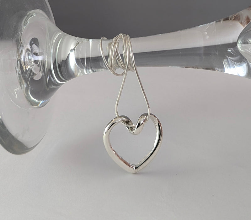 Load image into Gallery viewer, Looped Heart Necklace in Sterling Silver
