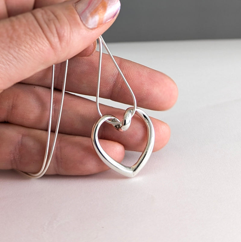 Load image into Gallery viewer, Looped Heart Necklace in Sterling Silver
