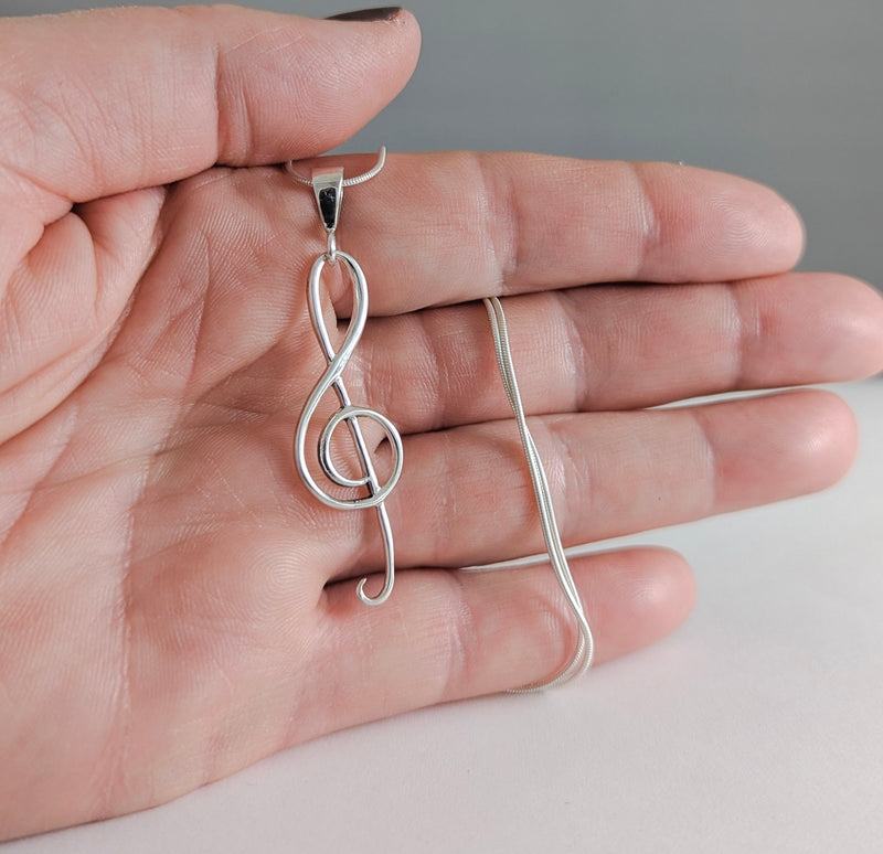 Load image into Gallery viewer, Statement Treble Clef Necklace in Sterling Silver
