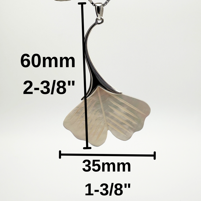 Load image into Gallery viewer, Silver leaf-shaped pendant on a branch with measurements indicated
