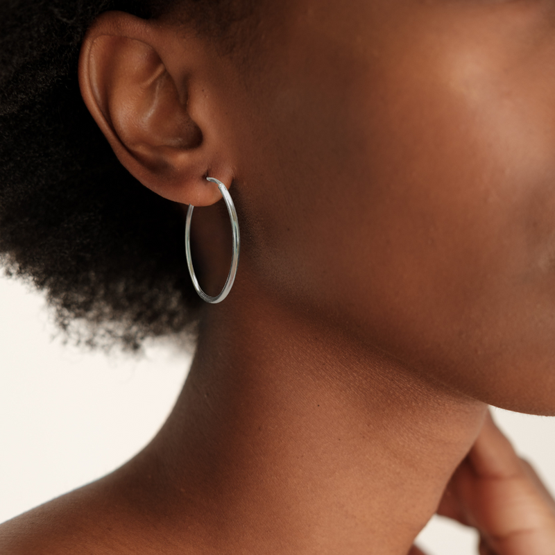 Load image into Gallery viewer, Sleek Oval Hoop in Sterling Silver
