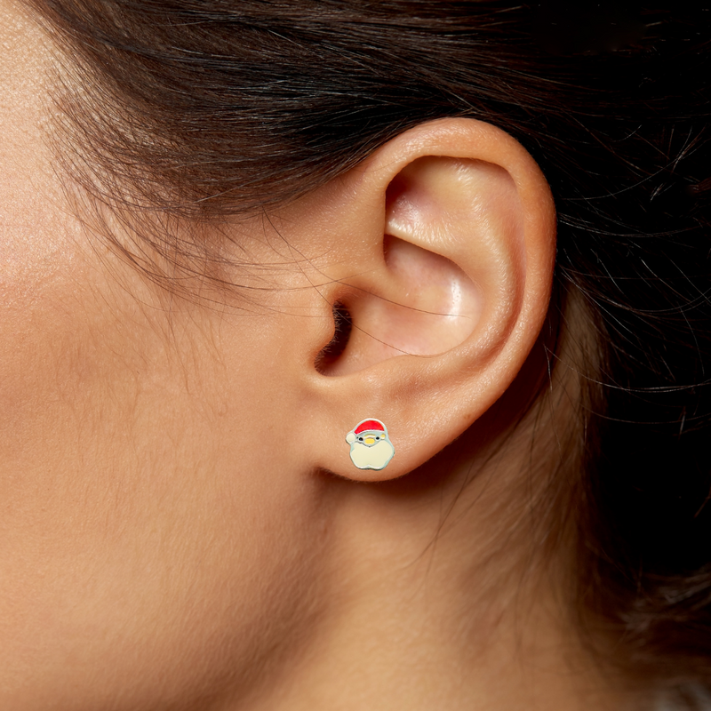 Load image into Gallery viewer, Close-up of an ear wearing a small santa face earring
