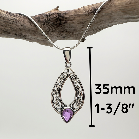 Silver pendant with purple gemstone on a branch, measurement details included