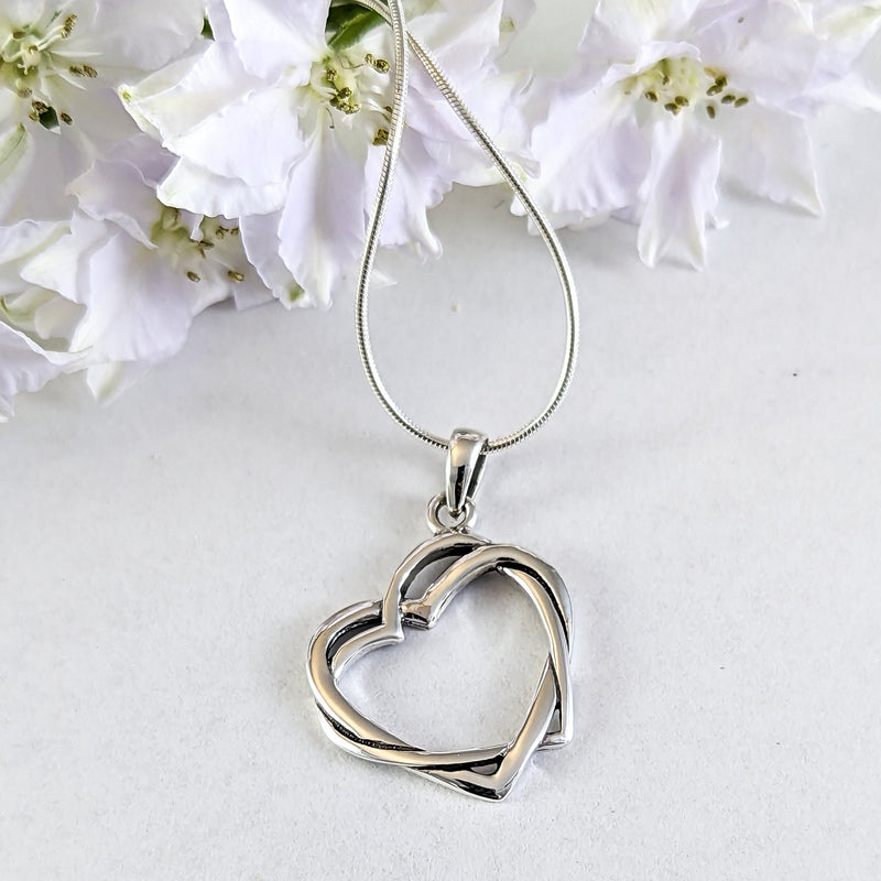 Load image into Gallery viewer, Entwined Hearts Pendant in Sterling Silver
