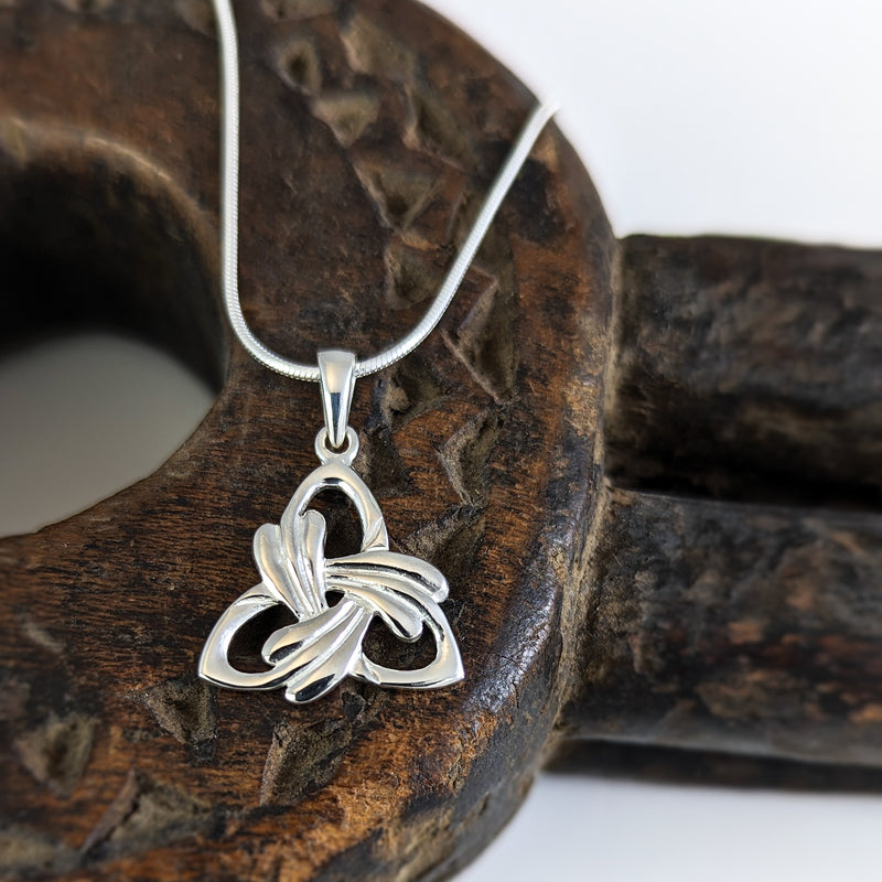 Load image into Gallery viewer, Feathered Trinity Knot Pendant in Sterling Silver
