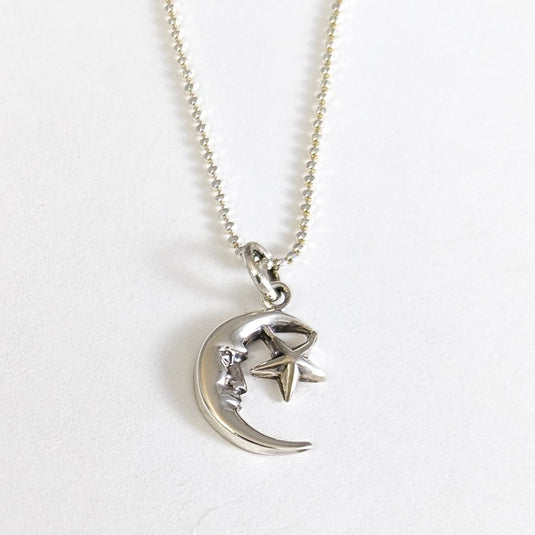 Man in the Moon Protects His Little Star Necklace in Sterling Silver