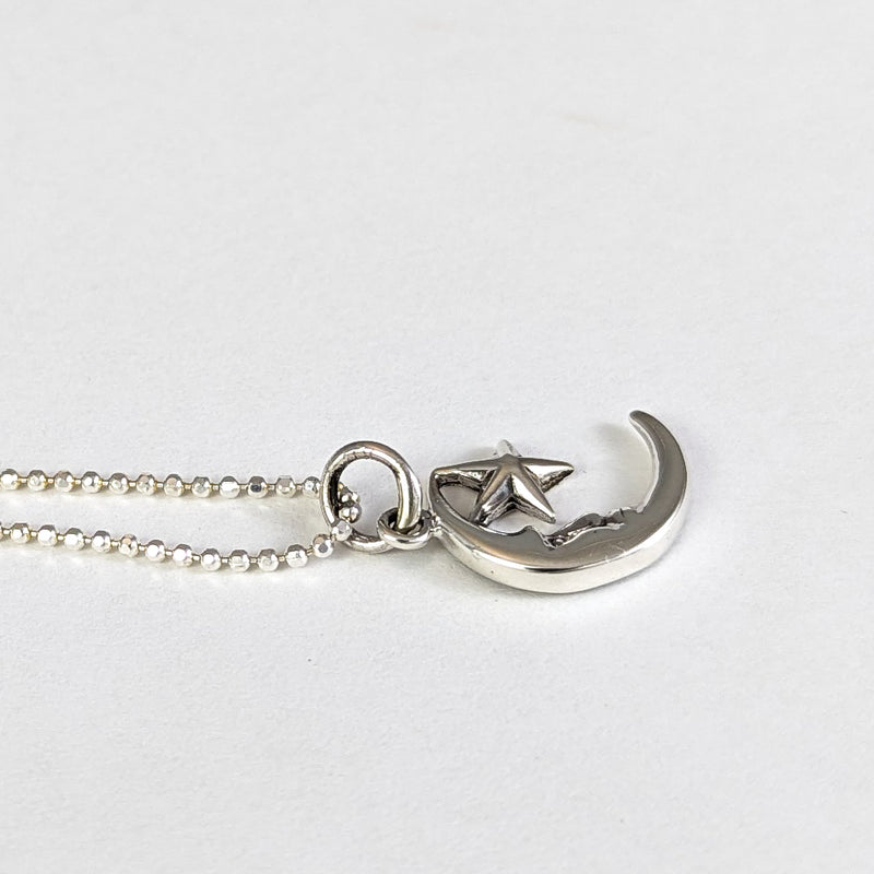 Load image into Gallery viewer, Man in the Moon Protects His Little Star Necklace in Sterling Silver
