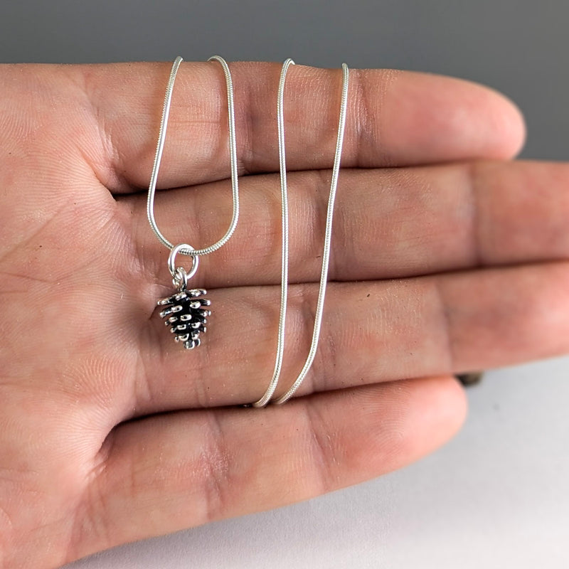 Load image into Gallery viewer, Itty-Bitty Pinecone Necklace in Sterling Silver
