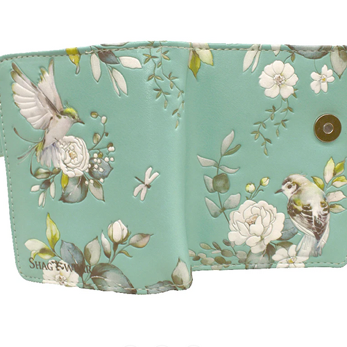 Floral and bird patterned wallet on a white background
