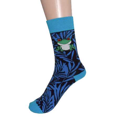 Sock with frog design on a mannequin foot against a white background