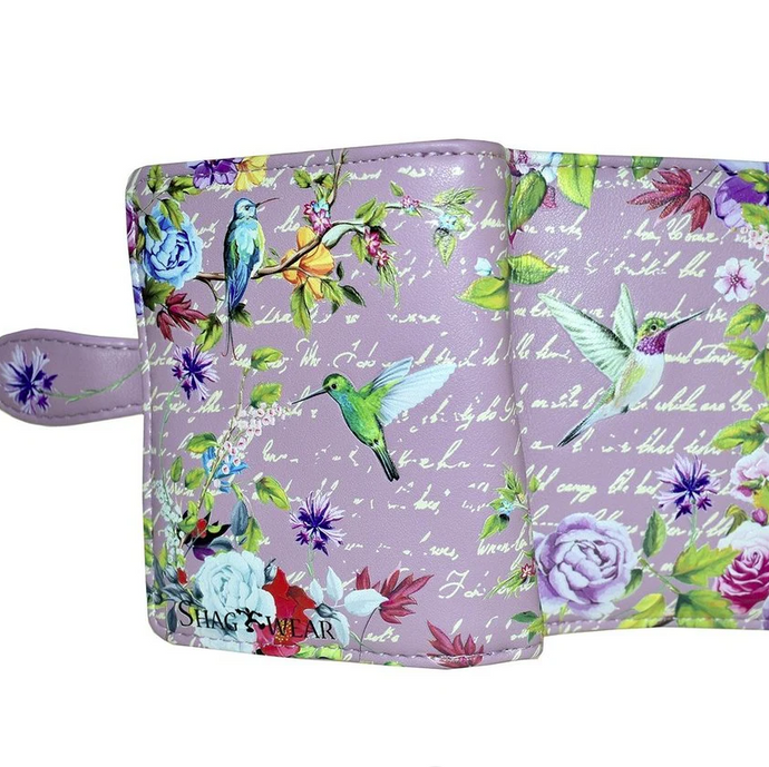 Floral and bird patterned wallet on a white background