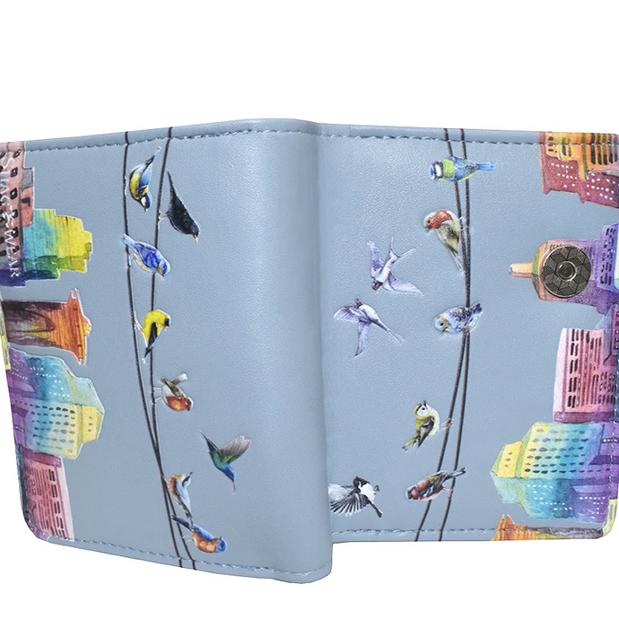 Colorful wallet with bird and building design on a light blue background