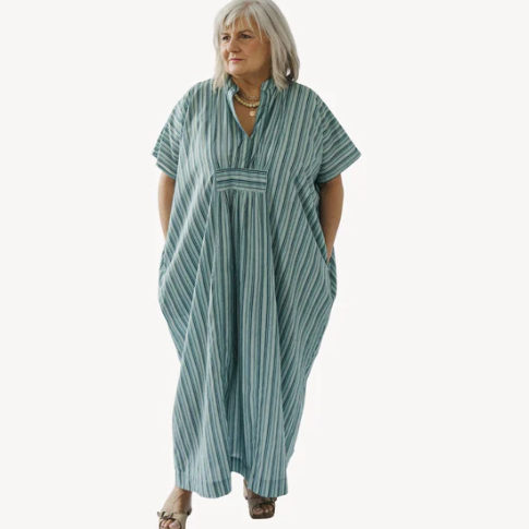 Load image into Gallery viewer, Woman wearing a green and white striped dress on a white background
