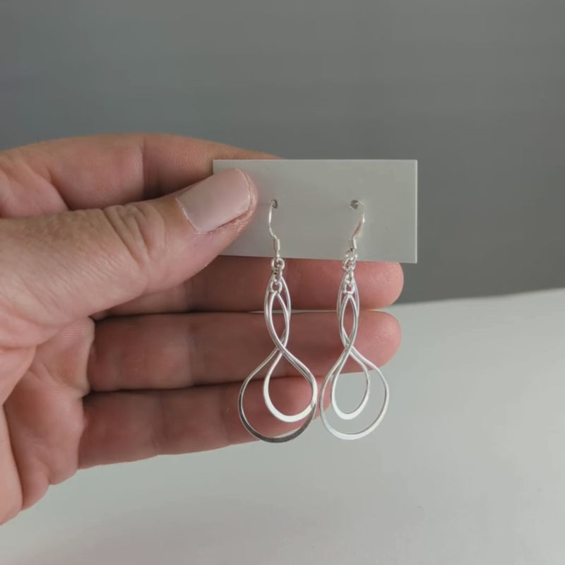 Load and play video in Gallery viewer, Twist within a Twist Earrings in Sterling Silver
