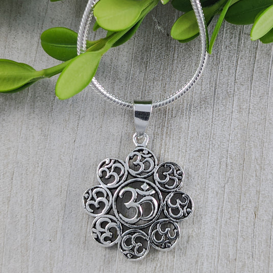 Om surrounded by Oms Pendant, Sterling Silver